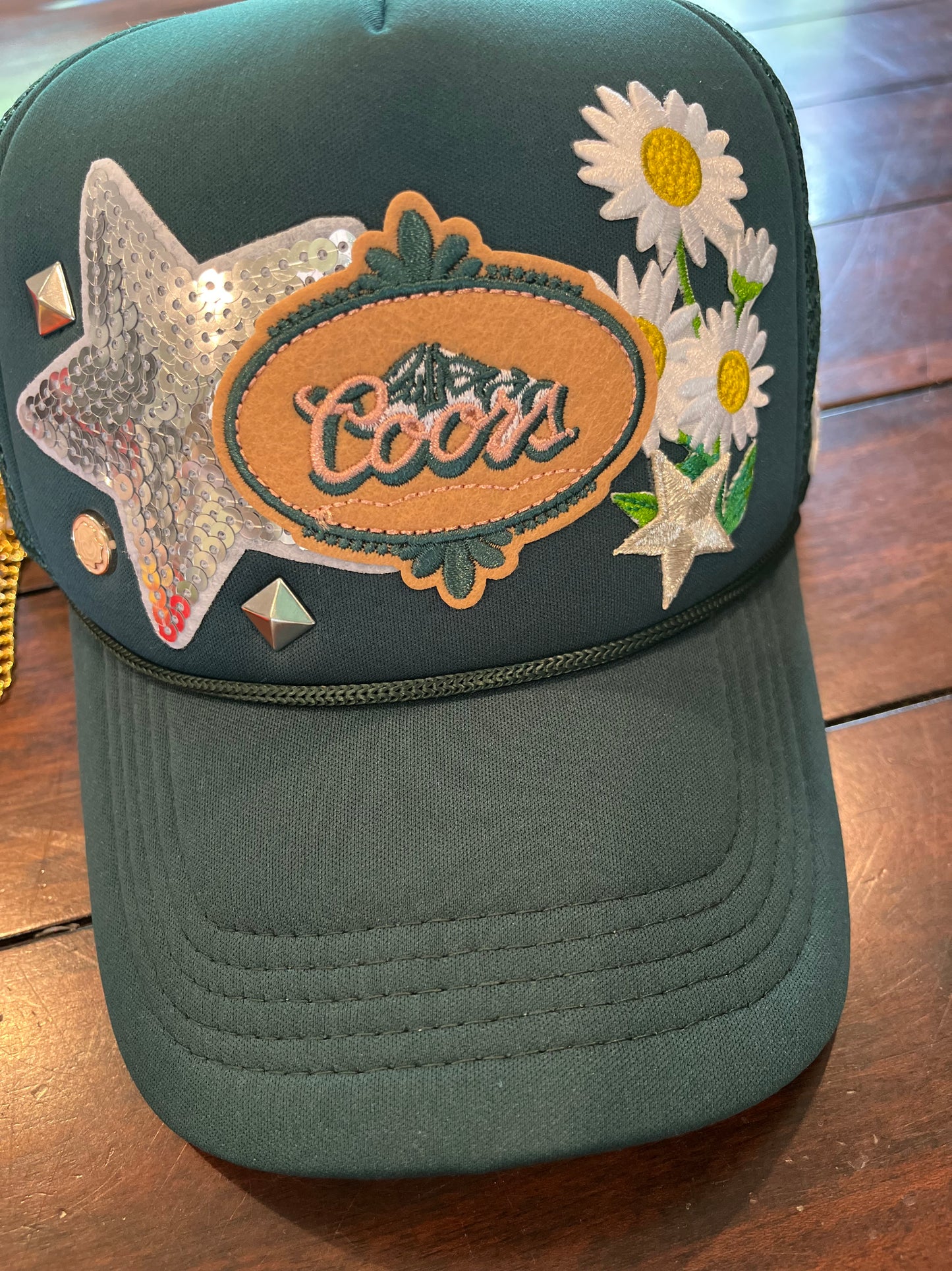 Coors and flowers trucker