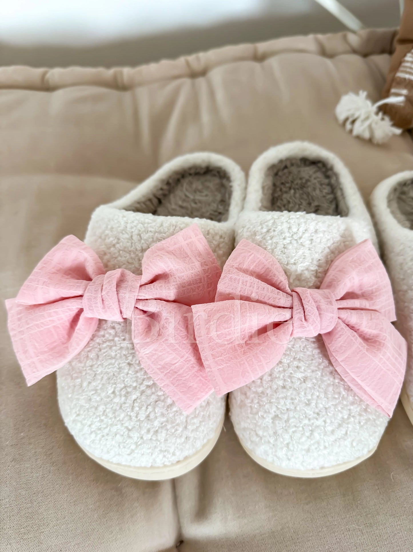 Pink bow slippers