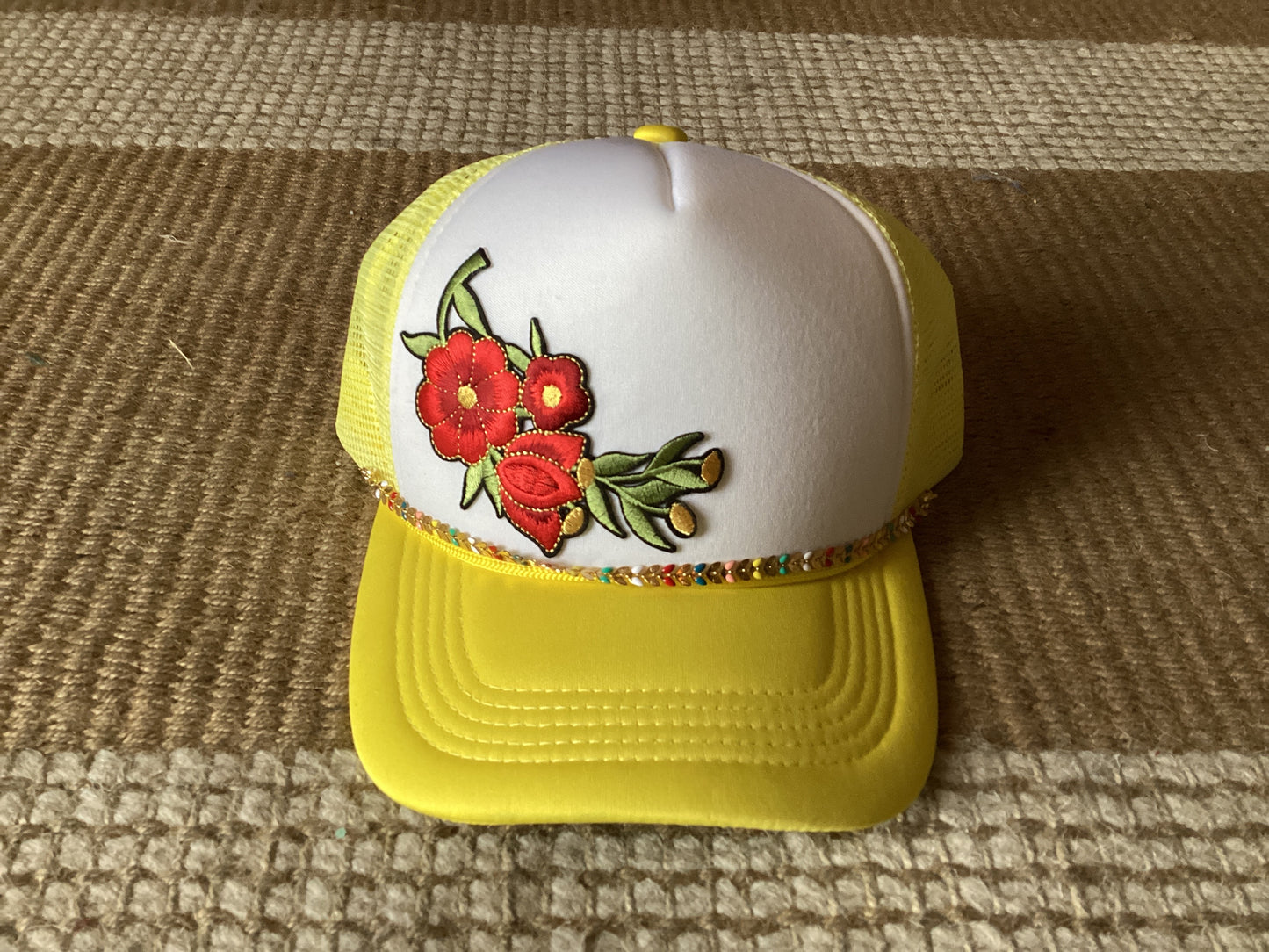 Simple red floral trucker hat